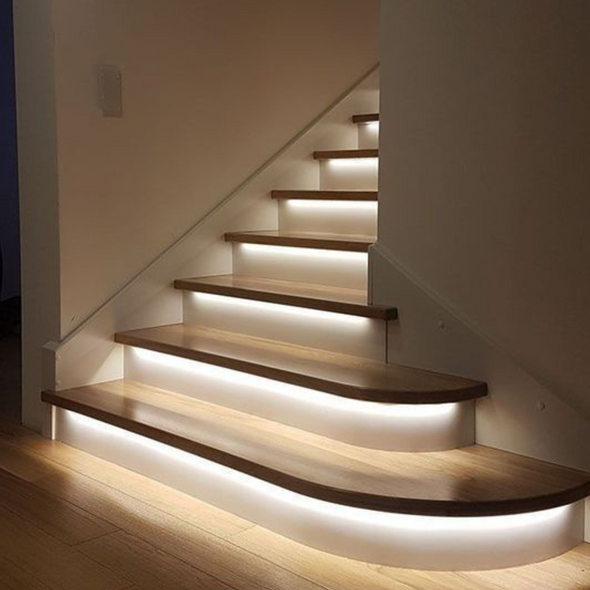 Balmain strip light lighting up indoor staircase steps 